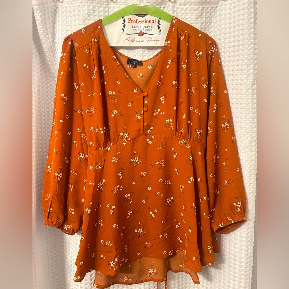 Gently worn a line blouse.